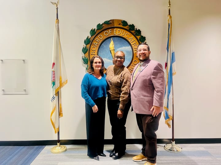 Three people stand in front of the Chicago Board of Education seal. Left to right: Ellen Rosenfeld, Dionne Mhoon, Carlos Rivas.
